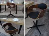 A collage of images showing a modern dining chair with a walnut-look bentwood frame and black faux leather seat, placed in a dining room setting with a wooden table and a rug. Produktbild-Vorschau