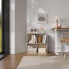 A home office scene with a bookshelf, desk, and chair. Náhľad obrázku produktu