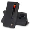 A black leather phone case with a card slot is shown standing upright, with a phone inserted into the back. Produktbild-Vorschau