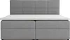 A grey upholstered boxspring bed with a white mattress topper, shown from the front. Voir les images du produit