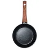 A top-down view of a frying pan with a wooden handle against a white background. Podgląd zdjęcia produktu