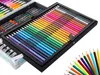 A close-up view of an open art set with colored pencils, crayons, and tubes of paint. Podgląd zdjęcia produktu
