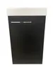 A black bathroom cabinet with a white top and a silver handle, shown against a white background. Náhled obrázku produktu