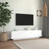 A modern living room scene featuring a white TV stand with a mounted television. Anteprima dell’immagine prodotto