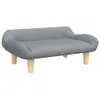 A gray fabric dog bed with four wooden legs, shown from a side angle against a white background. Podgląd zdjęcia produktu