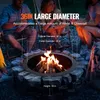 People sitting around a fire pit at night. Voir les images du produit
