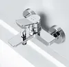 A close-up, studio shot of a chrome bathtub faucet mounted on a white surface. Produktbild-Vorschau