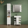 A modern bathroom vanity set with a tall cabinet, sink, and mirror against a textured green wall. Voir les images du produit