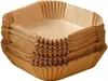 A stack of square, brown paper liners for an air fryer. Podgląd zdjęcia produktu