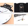 A collage of four images showing different views of a cat-themed wall clock. Produktbild-Vorschau