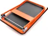 A close-up, angled view of a folded orange and black platform trolley against a white background. Náhled obrázku produktu