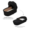 A black baby bassinet is shown in two configurations: one open and upright, and another folded flat. Text describes its features. Anteprima dell’immagine prodotto