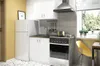 A small, modern kitchen with white cabinets, a refrigerator, a stove, and a sink. A yellow chair is visible near a window. Voir les images du produit