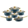 A set of blue and gold cookware is arranged on a white background. Voir les images du produit