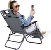 A woman is sitting in a reclining chair outdoors, looking at her phone and wearing headphones. Voir les images du produit