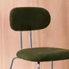 A close-up view of the back and seat of a green upholstered chair with chrome legs. Anteprima dell’immagine prodotto