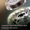 Close-up of a shaver head with blades spinning. Podgląd zdjęcia produktu