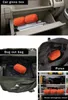 Collage showing an orange emergency bivvy bag in different locations: in a car glove box, inside a bug-out bag, inside a purse, and on a shelf in a home emergency closet. Podgląd zdjęcia produktu