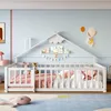A child's bedroom with a white house-shaped bed, pink bedding, and stuffed animals. Podgląd zdjęcia produktu
