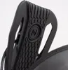 A close-up view of a black snowboard binding strap with a textured grip and a circular logo. Podgląd zdjęcia produktu