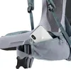 A close-up view of a backpack's hip belt and a pocket holding a smartphone. Podgląd zdjęcia produktu