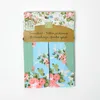 HOMESCAPES Blau-Rosa Gartenschürze mit Rosen-Design Produktbild-Vorschau 5
