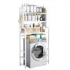 A white metal shelving unit placed over a washing machine, filled with various toiletries and cleaning supplies. Produktbild-Vorschau