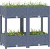 A two-tiered raised garden bed filled with plants and flowers, set against a white background. Produktbild-Vorschau