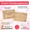 A flat lay image showcasing two birthday invitation cards made of kraft paper, along with a small white envelope. The cards have a hand-drawn aesthetic with birthday-themed illustrations and text. The background is a light pink gradient with scattered smal Produktbild-Vorschau