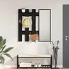 An entryway with a coat rack, mirror, and bench. Podgląd zdjęcia produktu