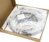 A product is shown inside a cardboard box, wrapped in bubble wrap and foam padding. Produktbild-Vorschau