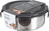 A round stainless steel food storage container with a black lid, presented on a white background. A product label with images of almonds is attached to the front. Náhled obrázku produktu