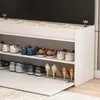 A white shoe cabinet with multiple shelves filled with shoes, and the bottom drawer is open. Podgląd zdjęcia produktu