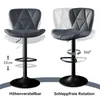Two bar stools are shown, one demonstrating height adjustment and the other demonstrating 360-degree rotation. Voir les images du produit