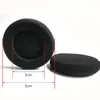 Two black foam ear pads for headphones are shown against a white background. One ear pad is shown from the side, and the other is shown from the top. Red lines and blue arrows indicate measurements of 3cm and 5cm. Produktbild-Vorschau