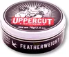 A close-up, slightly angled view of an Uppercut Deluxe Featherweight hair wax tin. Produktbild-Vorschau