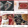 A collage of four images showcasing a small rug in different settings: in a car, by a doorway, with a cat, and with coffee and pastries. Produktbild-Vorschau