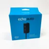 A blue cardboard box for an Amazon Echo Auto device, with the product image and branding visible. Podgląd zdjęcia produktu