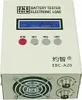 A white electronic battery tester with a display screen and buttons. Náhled obrázku produktu