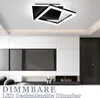 A modern living room with a TV, fireplace, and a stylish ceiling light. Produktbild-Vorschau