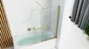 A modern bathroom with a bathtub and a glass shower screen with gold accents. Produktbild-Vorschau