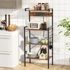 A kitchen shelf unit with various kitchen items on it, including a microwave, toaster, pots, bowls, and bottles. Podgląd zdjęcia produktu