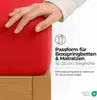 A hand is shown pressing down on a red fitted sheet on a bed, demonstrating its fit. Text overlays describe the product's features and certifications. Produktbild-Vorschau
