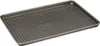 A perforated baking sheet on a gray background. Náhled obrázku produktu