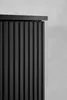 A close-up of a black ribbed cabinet. Produktbild-Vorschau
