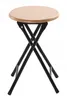 A folding stool with a light brown circular seat and black metal legs. Produktbild-Vorschau