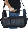 A person is holding a Stanley FatMax tool bag with a shoulder strap. Anteprima dell’immagine prodotto