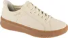 A single cream-colored Skechers sneaker with a brown sole is shown from a side angle against a white background. Voir les images du produit