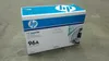 A box of HP toner cartridge on a concrete floor. Náhled obrázku produktu