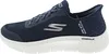 A side view of a blue Skechers sneaker with a white sole. Anteprima dell’immagine prodotto